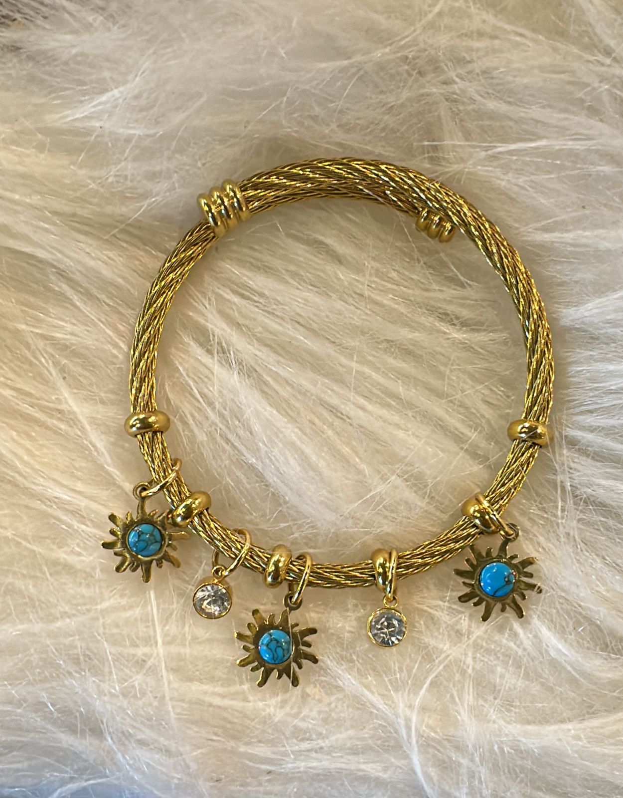 Elegant Gold Bracelet with Sun Charms