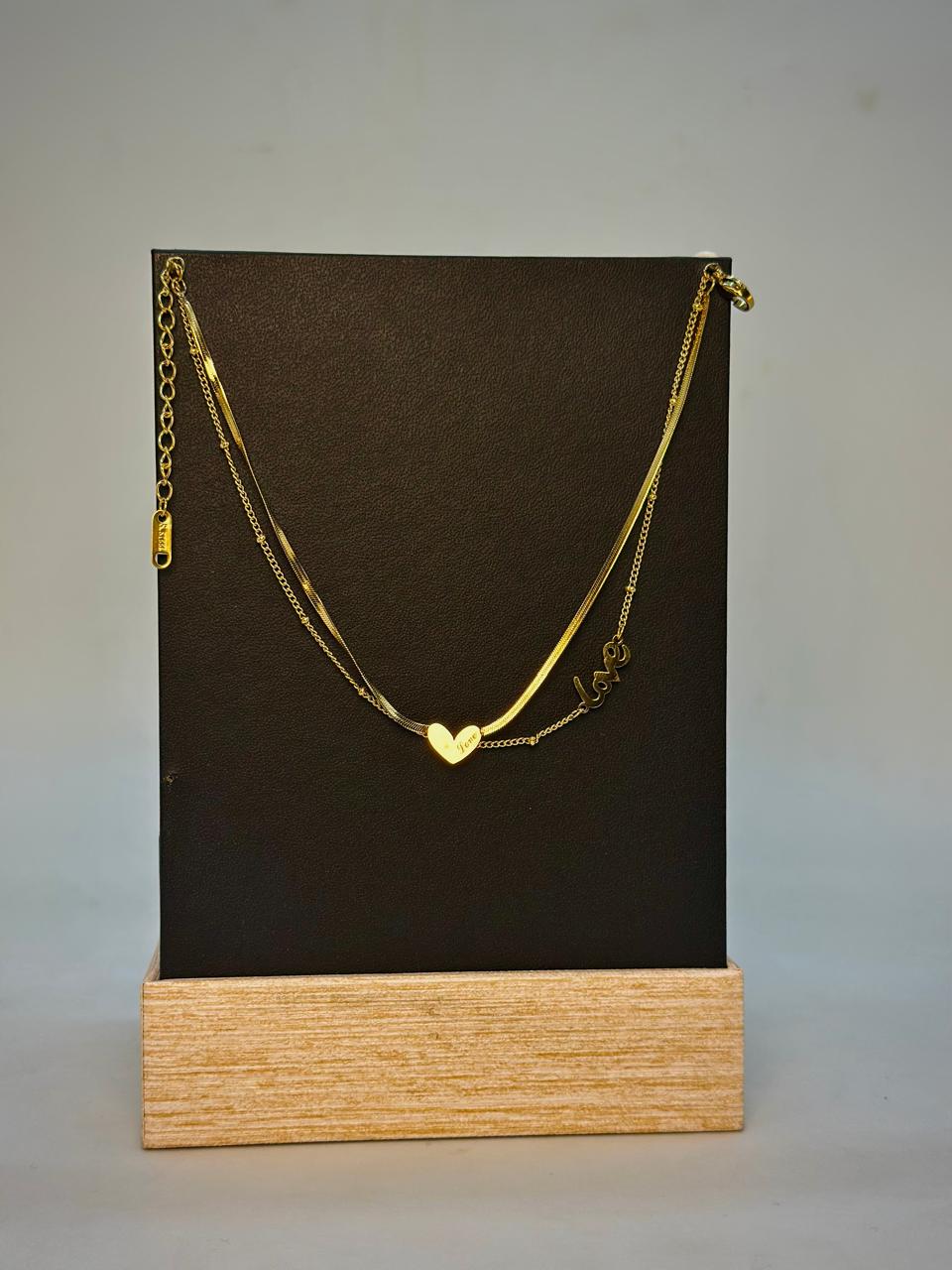 Elegant Heart Pendant with Love Inscription