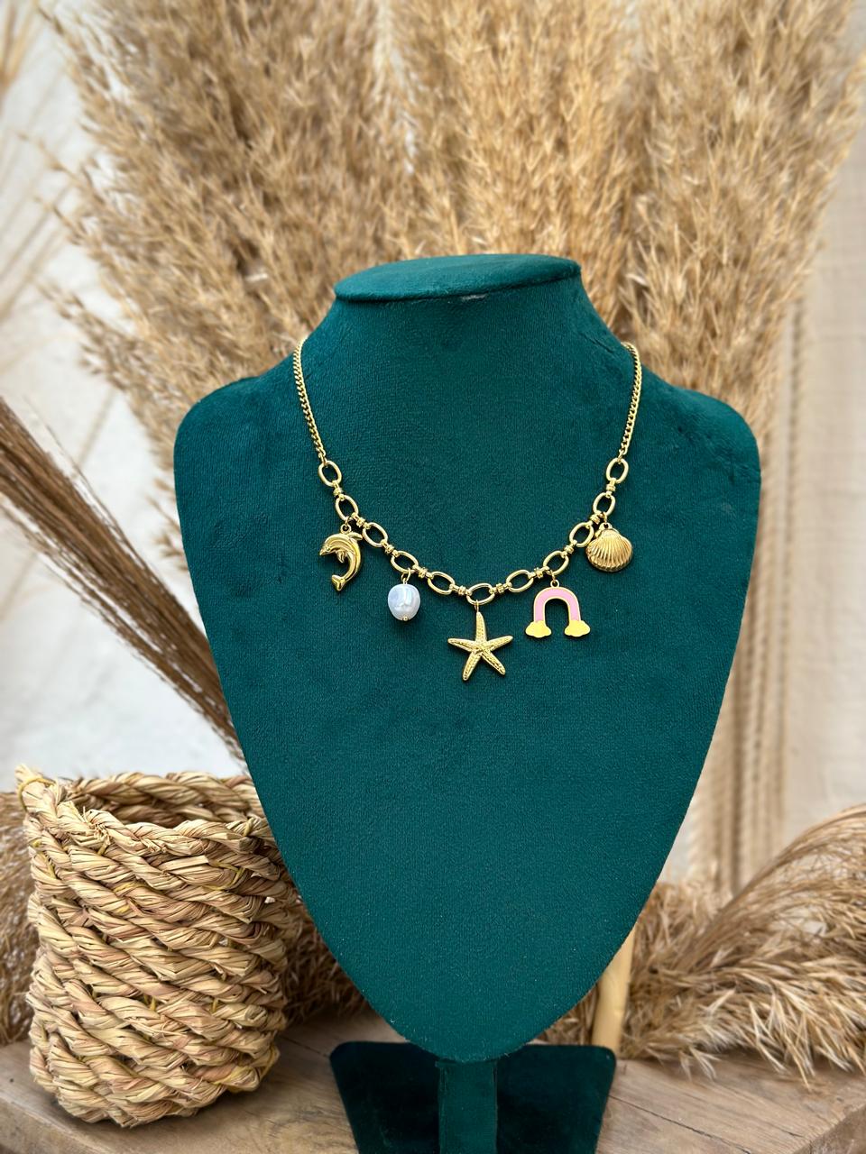 Elegant Necklace with Dolphin and Starfish Design